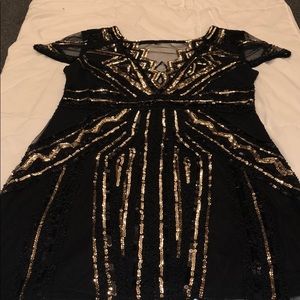 Beaded black and gold dress.